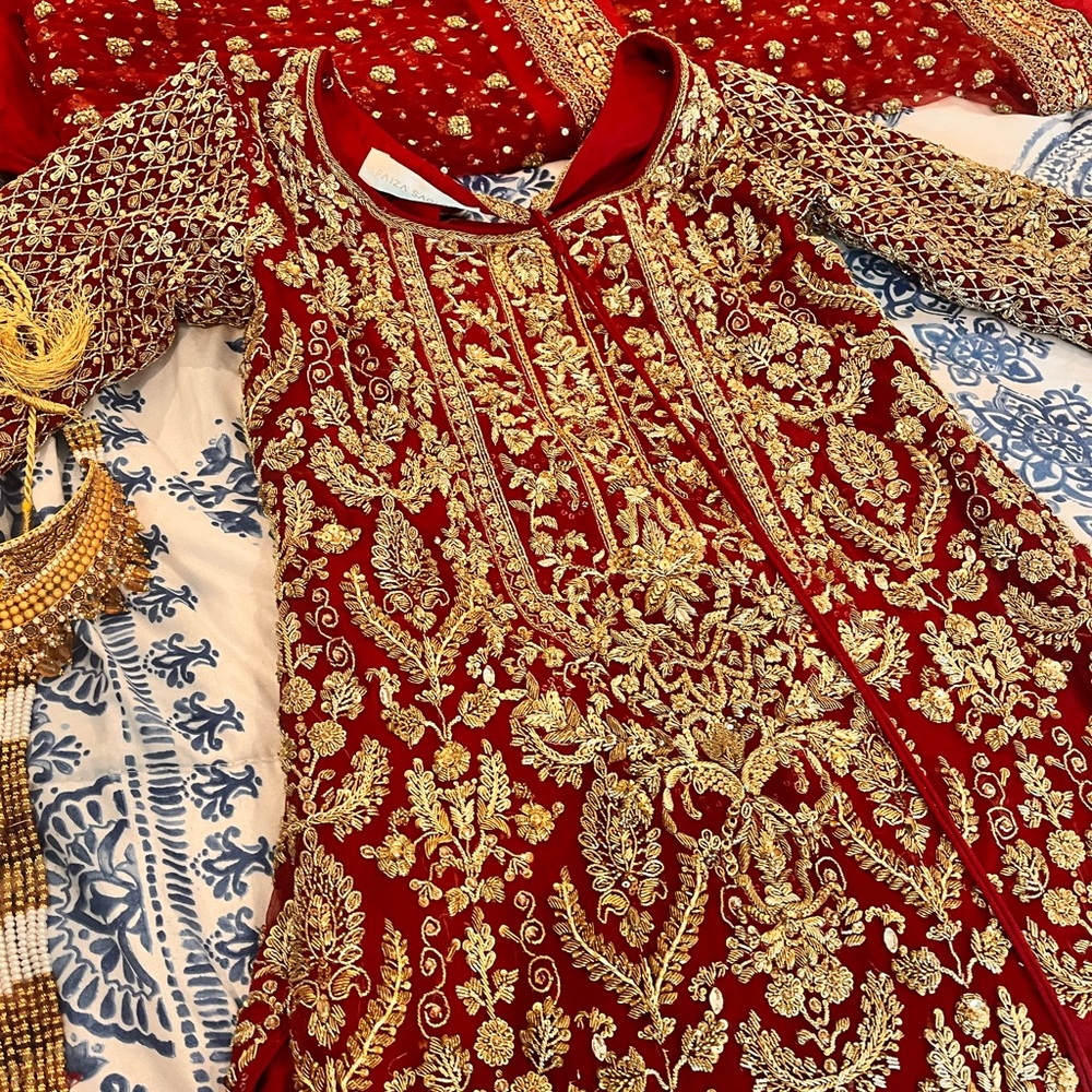A gorgeous & Royal Embellished Bridal Outfit by Designer Faiza Saqlain